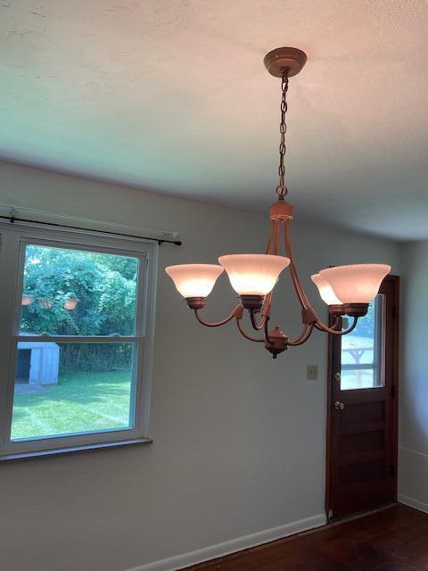 1401 E Home Rd, Springfield, OH 45503 - detailed view of a chandelier and wood finished floors