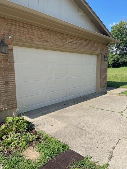 1401 E Home Rd, Springfield, OH 45503 - garage featuring driveway