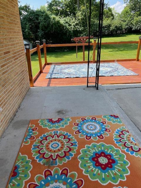 1401 E Home Rd, Springfield, OH 45503 - view of patio / terrace featuring a wooden deck and view of scattered trees