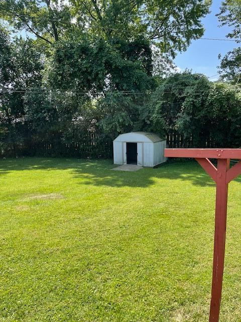 1401 E Home Rd, Springfield, OH 45503 - view of grassy yard with a shed