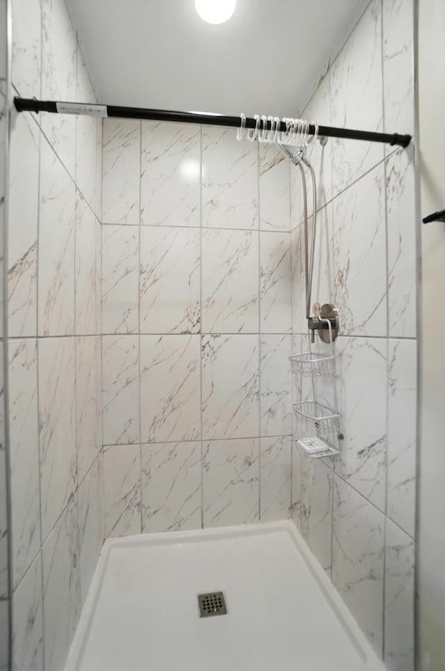 full bath featuring a stall shower