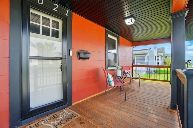 wooden deck with a porch