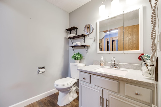 4212 Midfield St, Springfield, OH 45503 - half bathroom featuring wood finished floors and vanity
