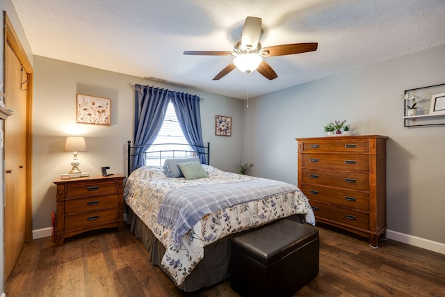 4212 Midfield St, Springfield, OH 45503 - bedroom with dark wood finished floors, ceiling fan, and a textured ceiling
