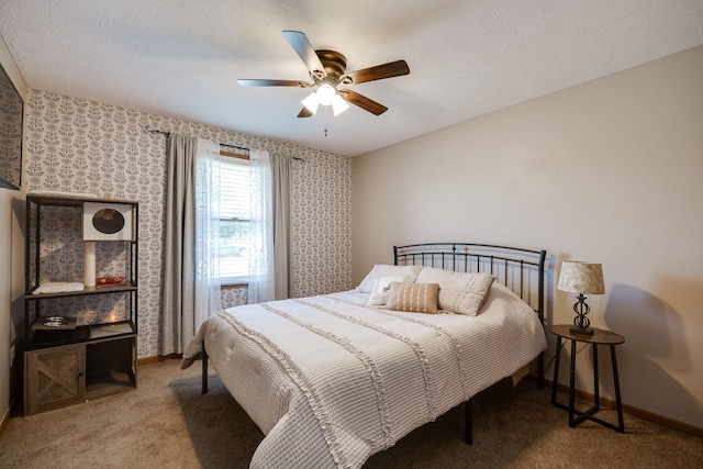 4212 Midfield St, Springfield, OH 45503 - carpeted bedroom with a ceiling fan, wallpapered walls, and a textured ceiling
