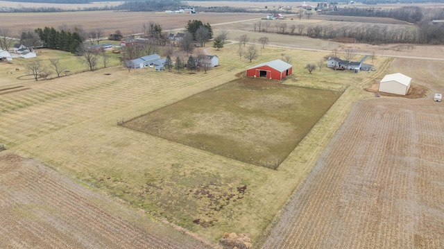 birds eye view of property featuring a rural view