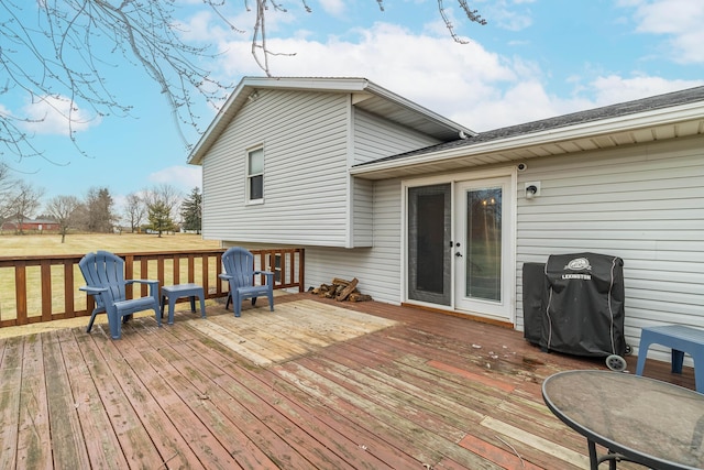 wooden deck featuring grilling area