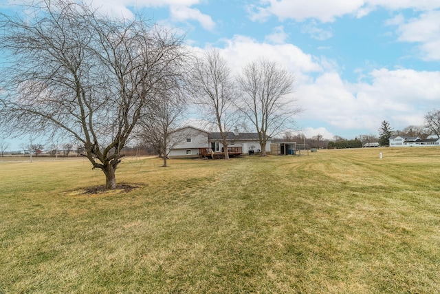 view of yard with a rural view