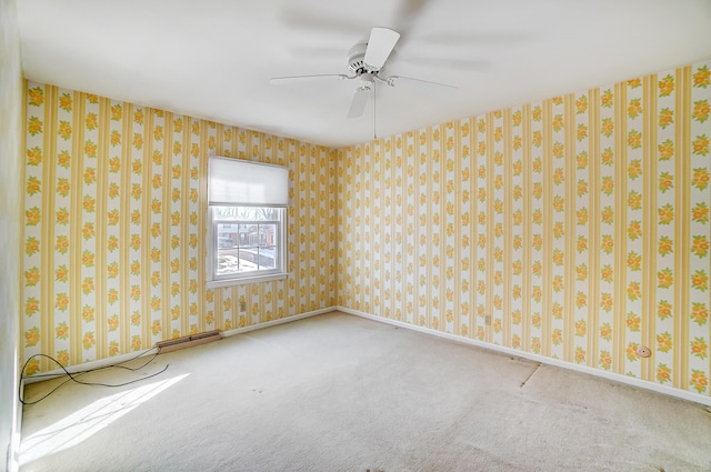 2831 Wellsford Ln, Springfield, OH 45503 - spare room with carpet, baseboards, and ceiling fan