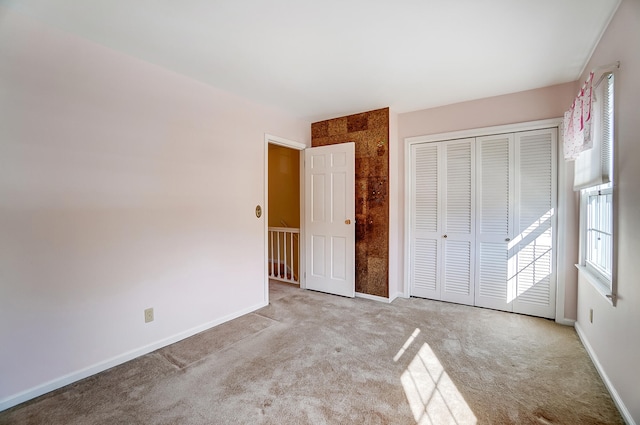 2831 Wellsford Ln, Springfield, OH 45503 - unfurnished bedroom with carpet floors, a closet, and baseboards
