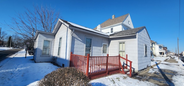 view of snow covered property