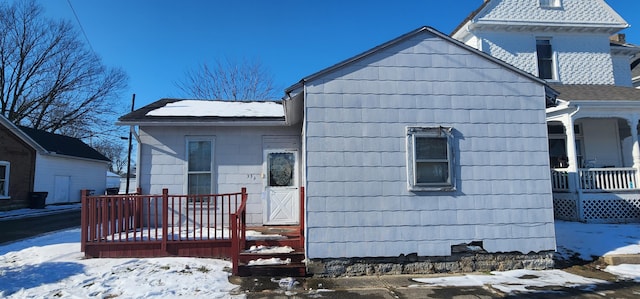 view of snow covered property