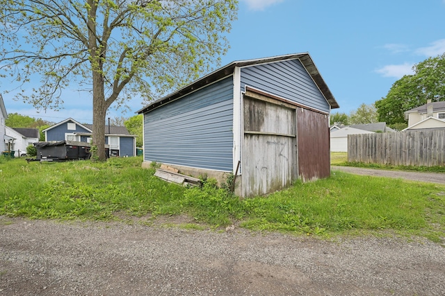 1566 Cora St, Springfield, OH 45503 - view of outbuilding featuring fence and an outdoor structure