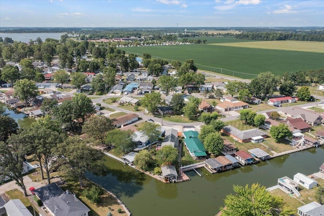 bird's eye view with a rural view and a water view