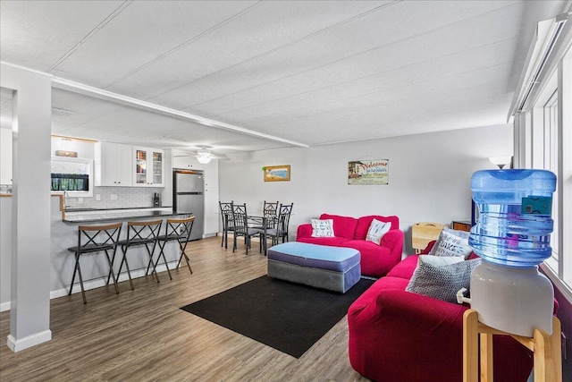 living room with wood-type flooring