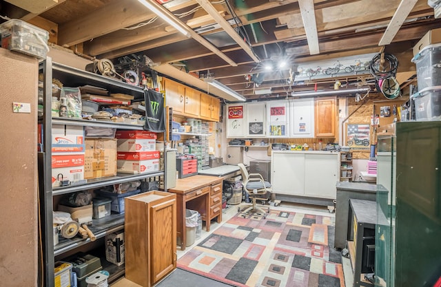 unfinished basement with a workshop area