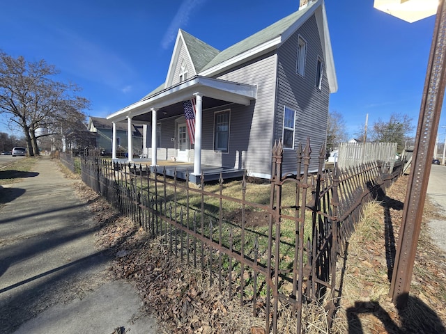 view of home's exterior featuring covered porch