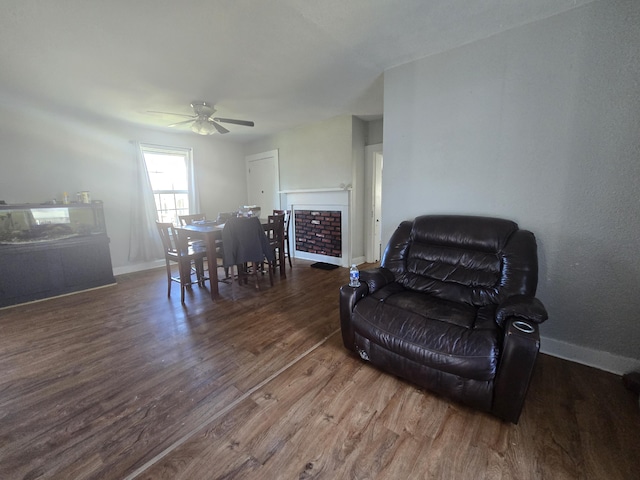 dining area with dark hardwood / wood-style floors and ceiling fan