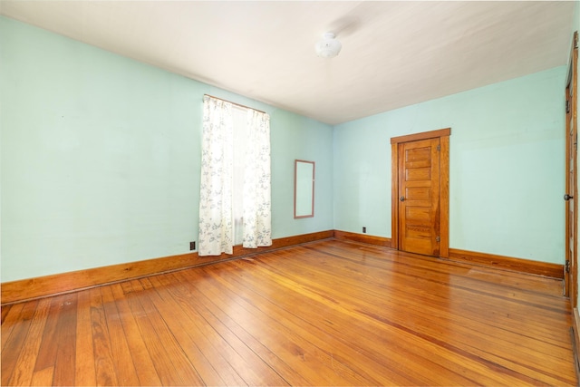 312 E Buckeye St, Belle Center, OH 43310 - empty room with baseboards and light wood finished floors