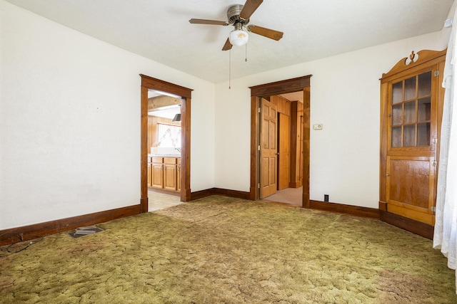 312 E Buckeye St, Belle Center, OH 43310 - carpeted spare room with baseboards and ceiling fan