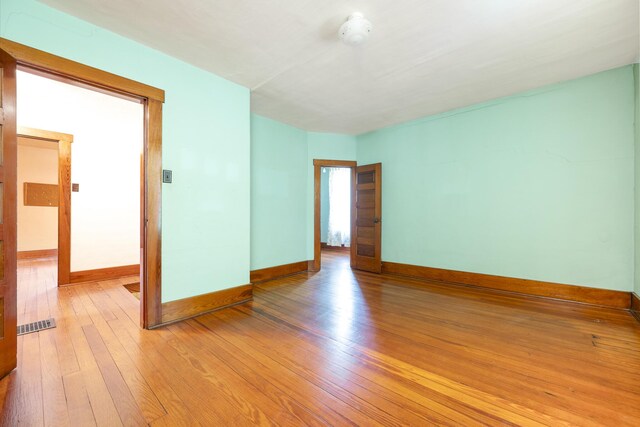 312 E Buckeye St, Belle Center, OH 43310 - empty room featuring baseboards and light wood finished floors