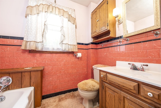 312 E Buckeye St, Belle Center, OH 43310 - full bath featuring tile walls, toilet, vanity, wainscoting, and a bath