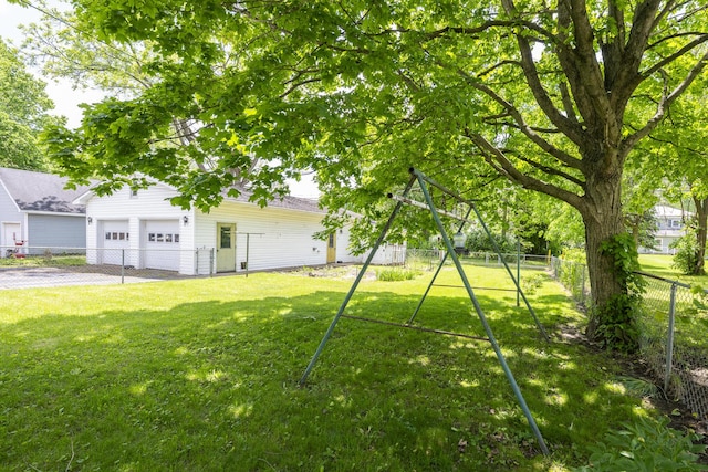 312 E Buckeye St, Belle Center, OH 43310 - view of yard featuring a garage