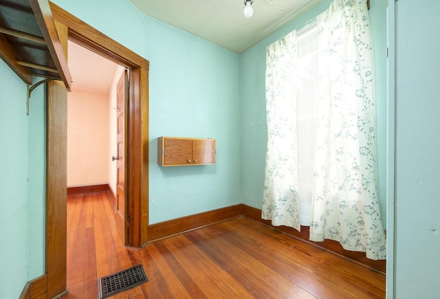 312 E Buckeye St, Belle Center, OH 43310 - hall featuring hardwood / wood-style floors and baseboards
