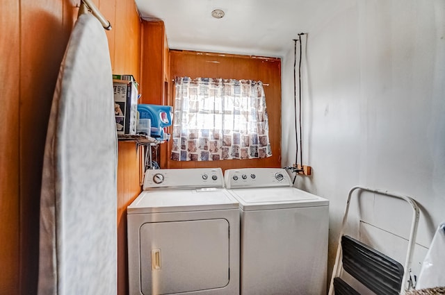 washroom featuring washer and clothes dryer