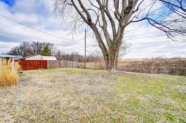 view of yard featuring fence