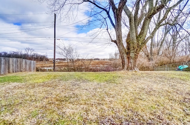 view of yard with fence