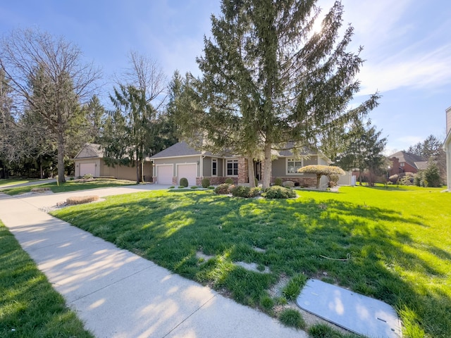 obstructed view of property featuring driveway, a front yard, and a garage
