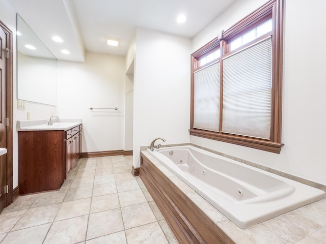 full bath featuring tile patterned flooring, recessed lighting, vanity, and a jetted tub