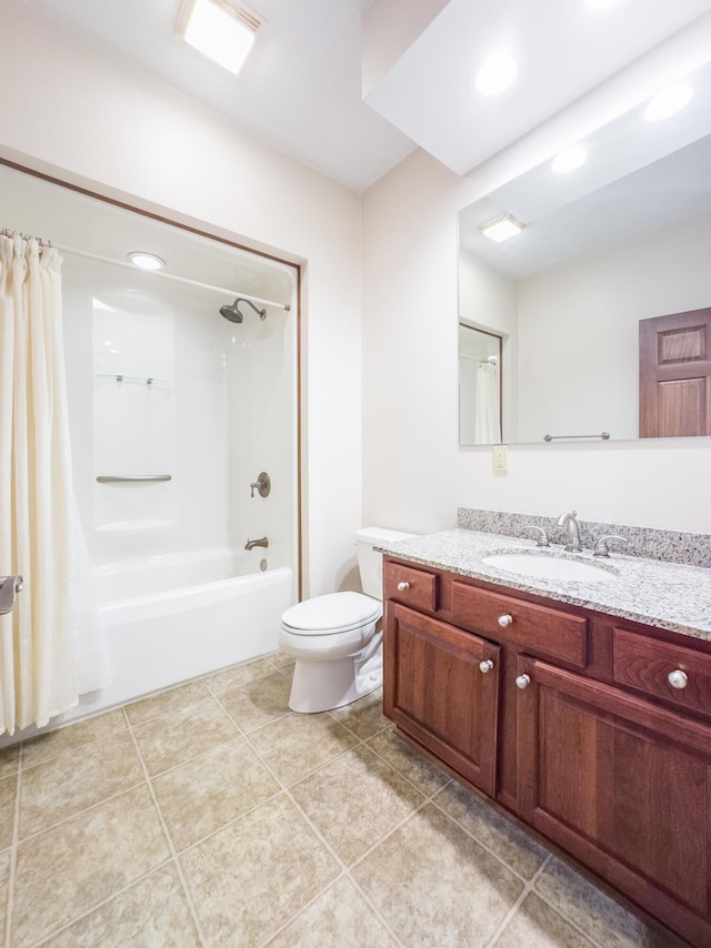 full bath with shower / tub combo with curtain, vanity, tile patterned floors, and toilet