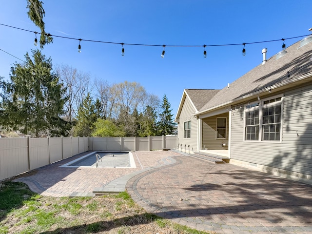 exterior space with a fenced backyard