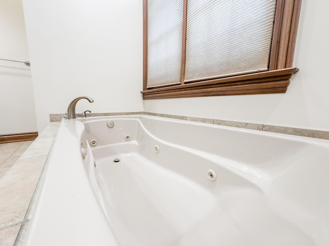bathroom featuring a whirlpool tub