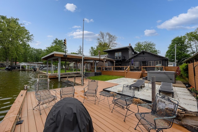 11181 Elm St, Lakeview, OH 43331 - dock with a hot tub and a deck with water view