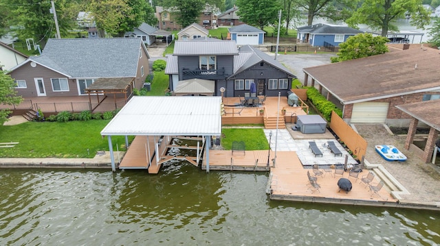 11181 Elm St, Lakeview, OH 43331 - dock area featuring boat lift, a residential view, and a deck with water view