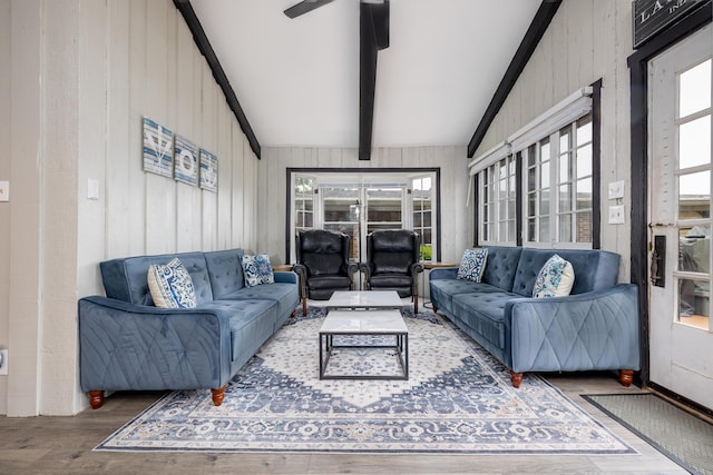 11181 Elm St, Lakeview, OH 43331 - living room featuring wood finished floors, a ceiling fan, and wood walls