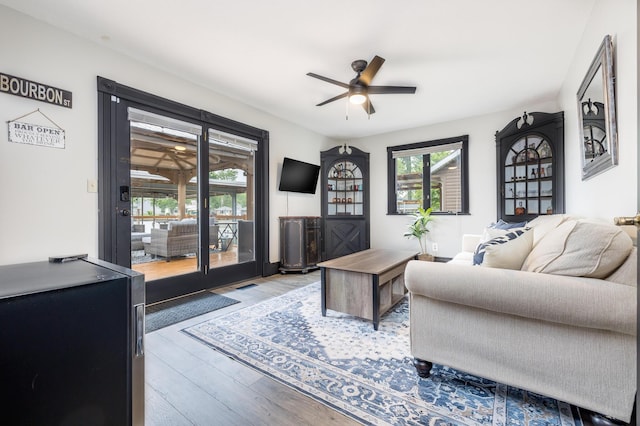 11181 Elm St, Lakeview, OH 43331 - living room with a ceiling fan and wood finished floors
