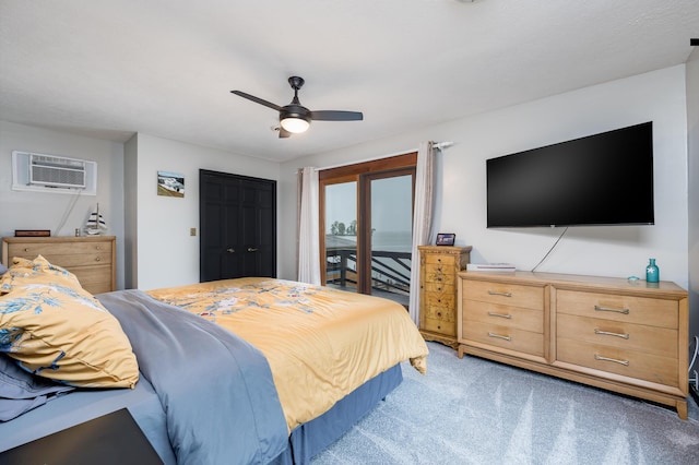 11181 Elm St, Lakeview, OH 43331 - bedroom featuring light colored carpet, access to exterior, ceiling fan, and a wall mounted AC