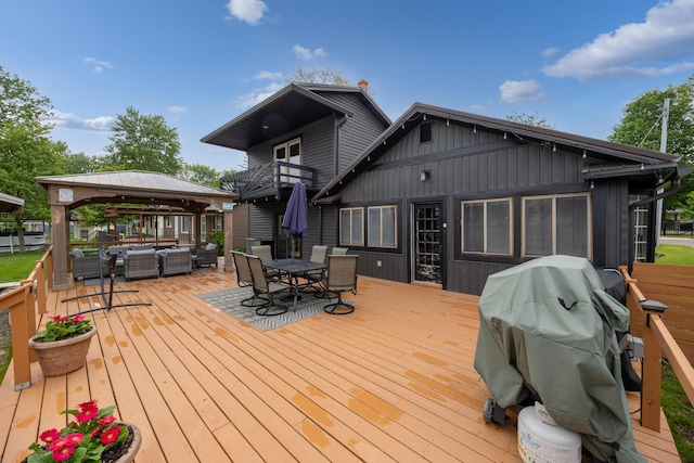 11181 Elm St, Lakeview, OH 43331 - wooden terrace with a gazebo, outdoor dining area, and outdoor lounge area