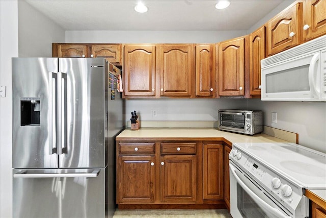 kitchen featuring white appliances