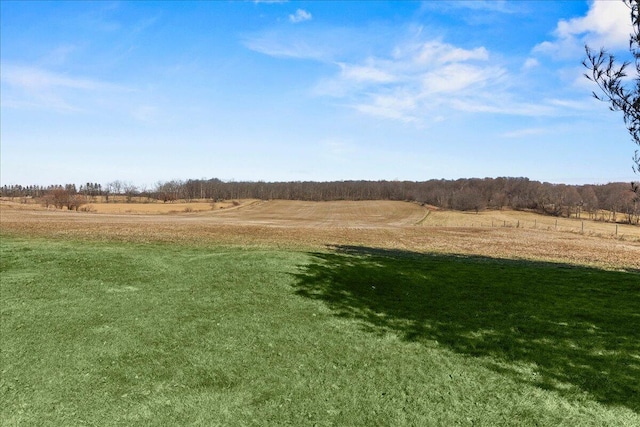 exterior space with a rural view