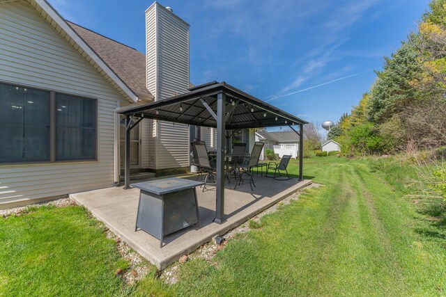 exterior space featuring a gazebo and a patio