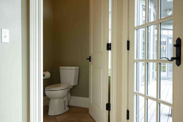 429 Braytonburne Dr, Springfield, OH 45503 - bathroom with toilet, tile patterned floors, and baseboards