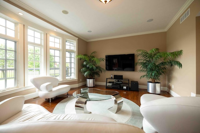 429 Braytonburne Dr, Springfield, OH 45503 - living room featuring healthy amount of natural light, wood finished floors, ornamental molding, and baseboards