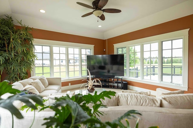 429 Braytonburne Dr, Springfield, OH 45503 - living room with healthy amount of natural light, baseboards, ceiling fan, recessed lighting, and lofted ceiling