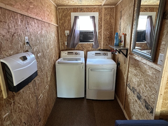 11240 Mohawk Path, Lakeview, OH 43331 - laundry room with washer and dryer, cooling unit, and dark flooring