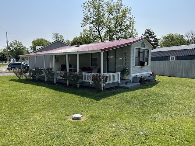 11240 Mohawk Path, Lakeview, OH 43331 - view of front of home with a front lawn and metal roof